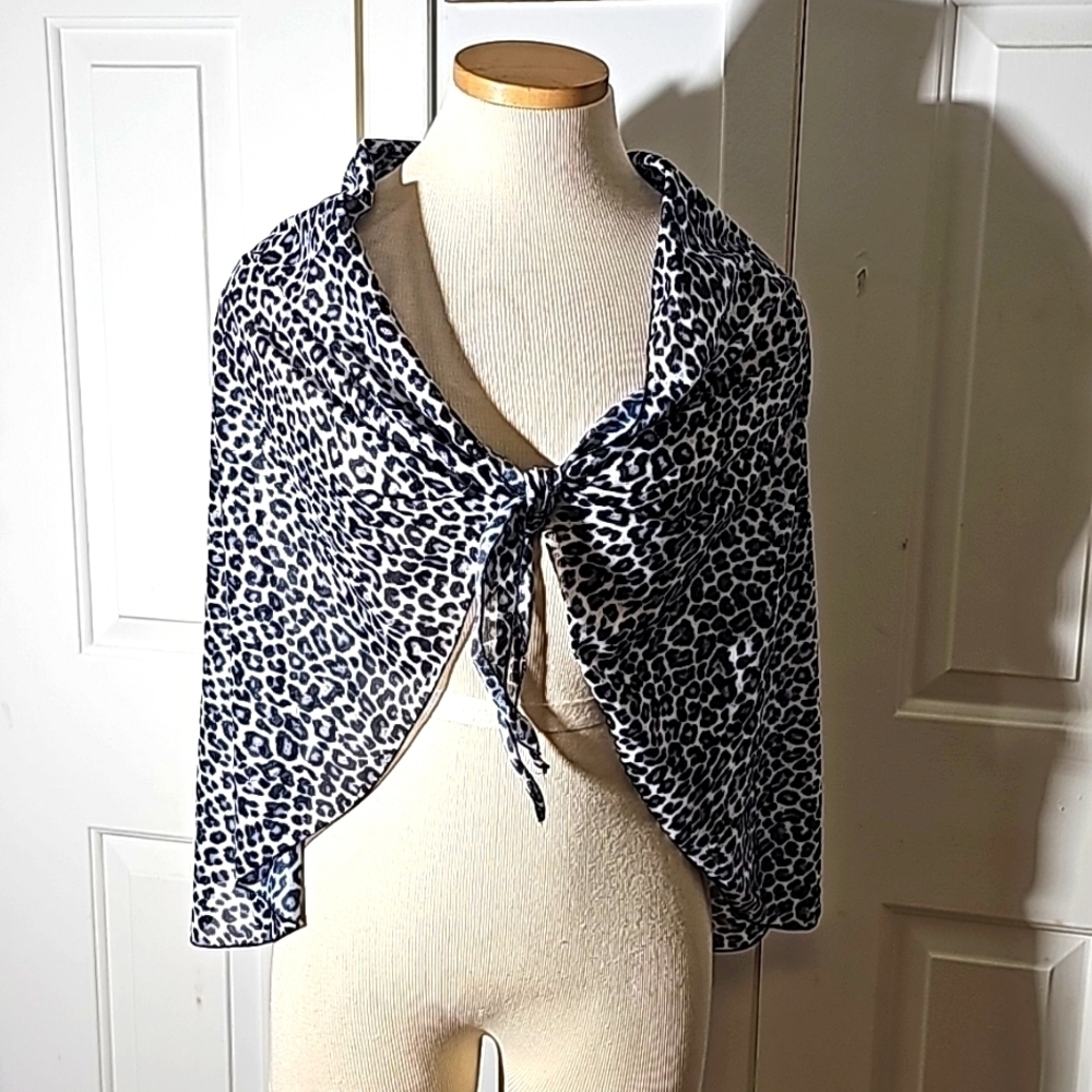 In Gear, animal print scarf, cover. Black, gray, and white. Very good used cond.
